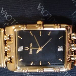Brand new Bulova 18 karat gold watch